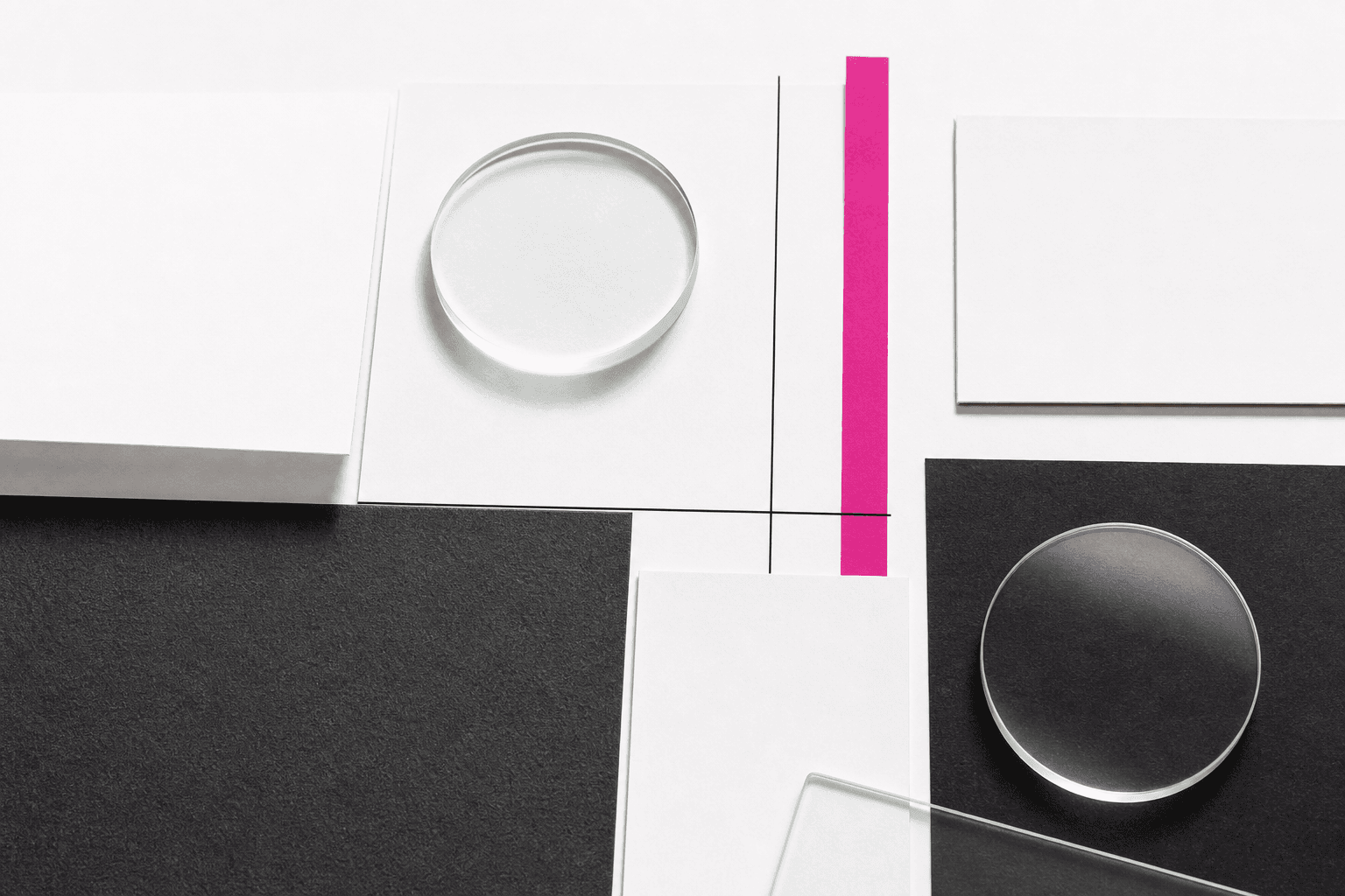 Editorial crop-grid made from photo paper and a magenta registration strip